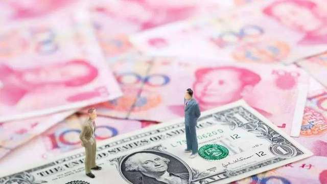 图片：人民币汇率双破7 个人如何应对？